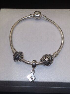 Authentic Pandora 7'' Sterling Silver Bracelet with 3 Charms all sterling silver